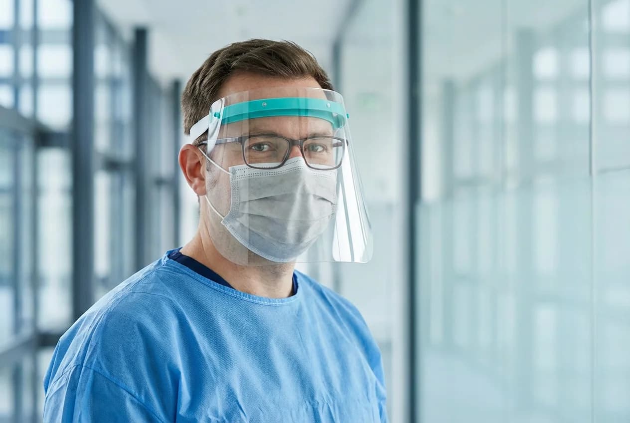 close view on a doctor wearing personal protective equipment 